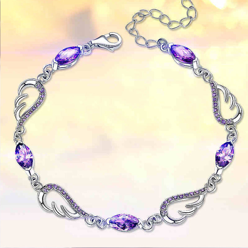 Sterling Silver Angel Wing Bracelet — Purple Crystal Accent