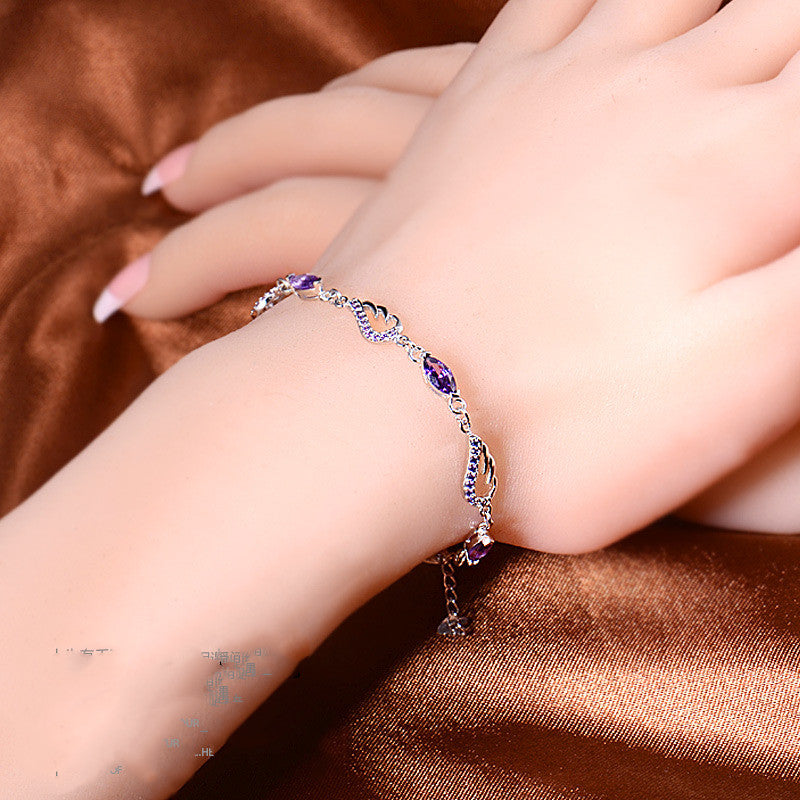 Sterling Silver Angel Wing Bracelet — Purple Crystal Accent